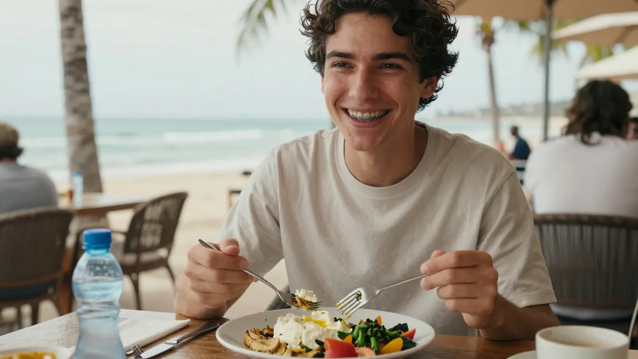 Person enjoying a meal at a café with soft foods, toothbrush and water bottle nearby, on a vacation setting.